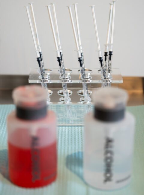 Prepared syringes in a rack